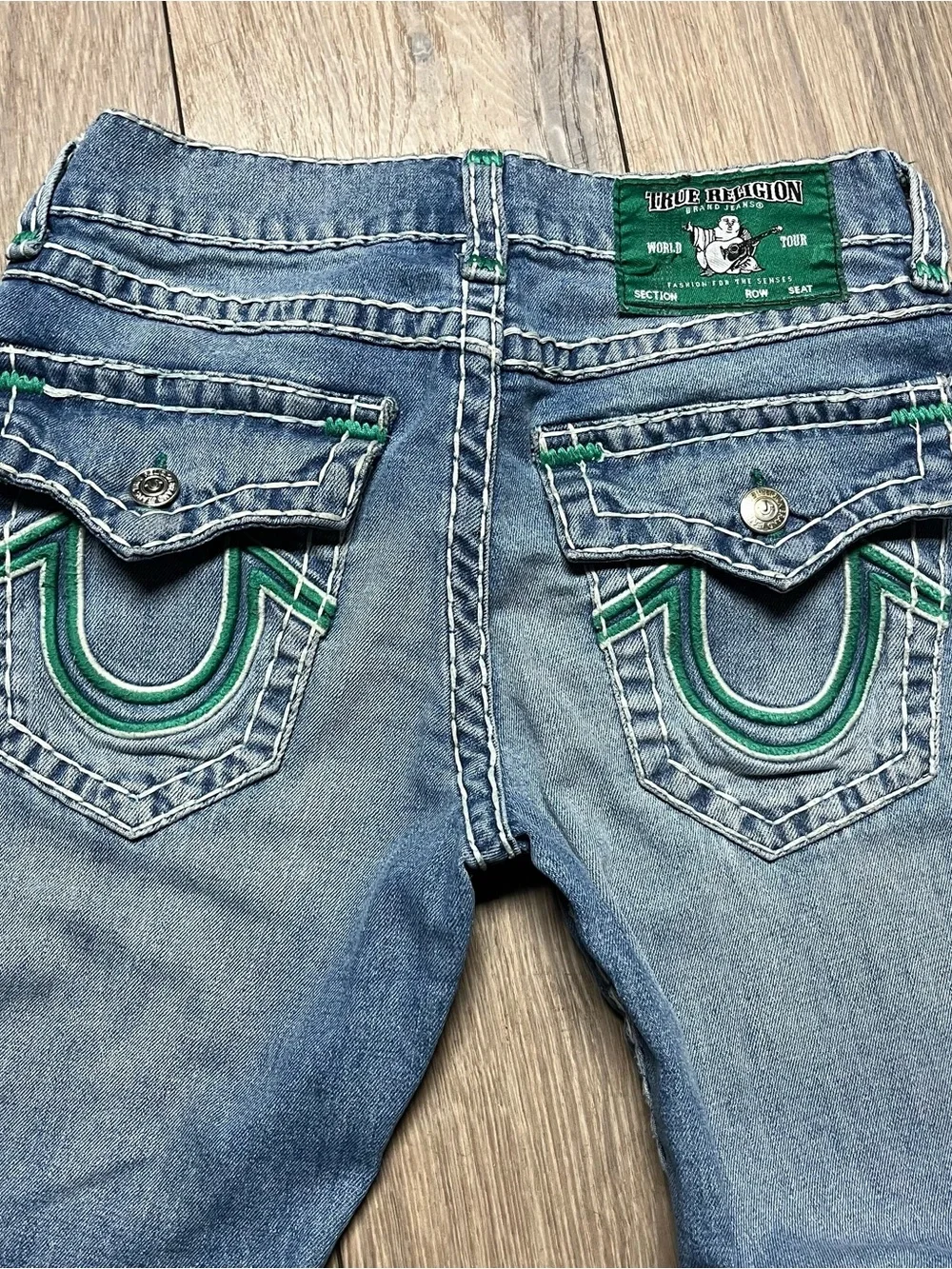 True Religion Men's Light Blue Denim Jeans with Green Accents
